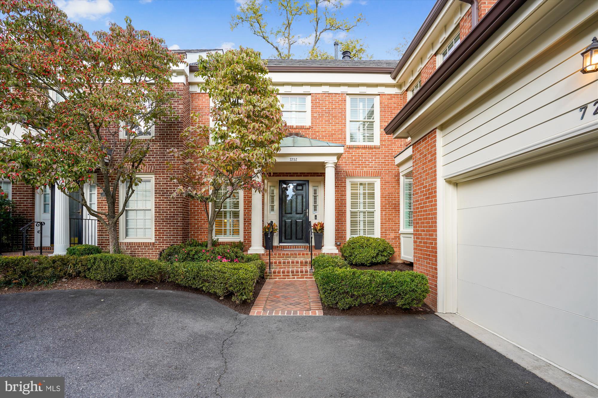 7252 Evans Mill Road McLean, VA 22101 - Photo 3 of 89 a front view of a house with garden