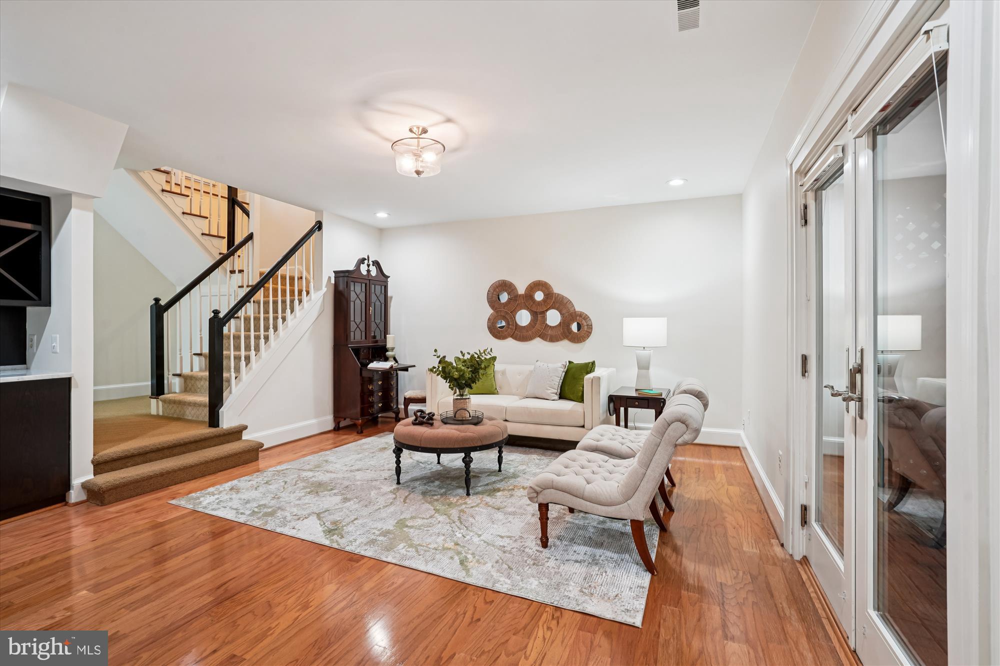 7252 Evans Mill Road McLean, VA 22101 - Photo 43 of 89 a living room with furniture and a wooden floor