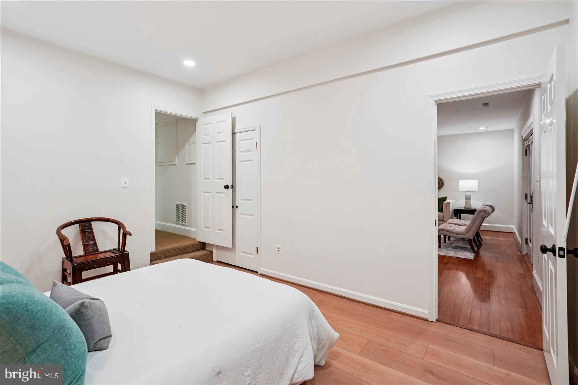 7252 Evans Mill Road McLean, VA 22101 - Photo 48 of 89 a bedroom with a bed and a mirror