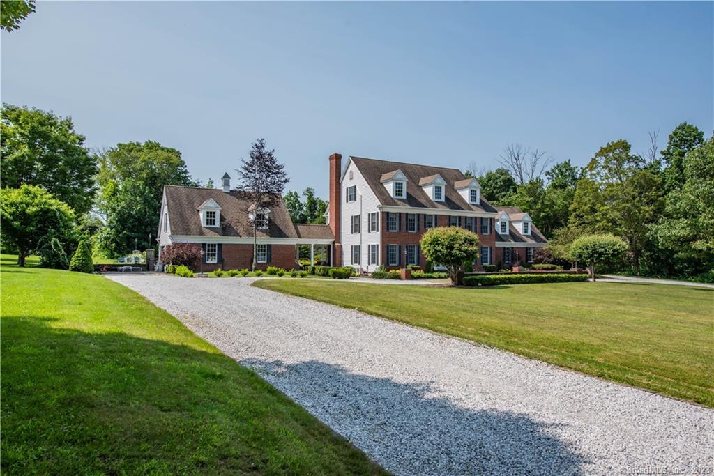 87 Auncient Oak Road Bethlehem, CT 06751 - Photo 1 of 1 a front view of a house with garden