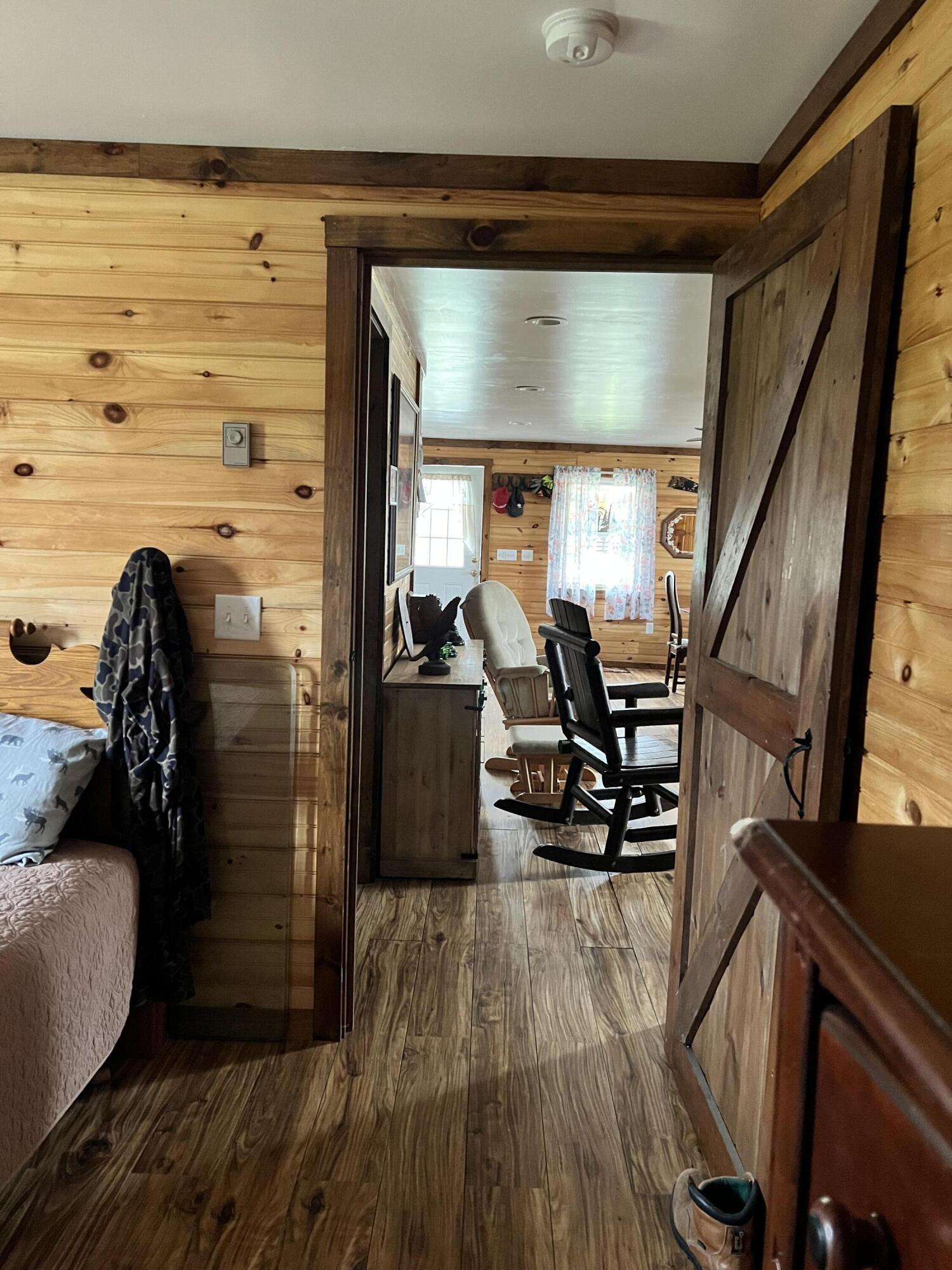 1010 Dexter Road St. Albans, ME 04971 - Photo 17 of 20 barn doors -bedrooms and bathrm