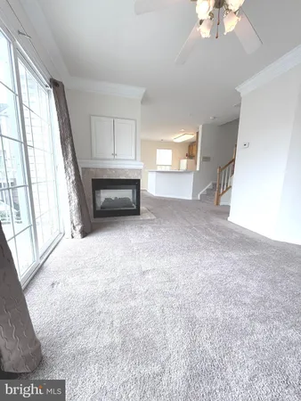 a view of livingroom and workspace
