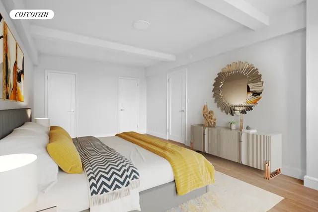 a bedroom with a bed and dresser