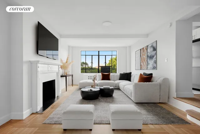 a living room with fireplace furniture and a flat screen tv