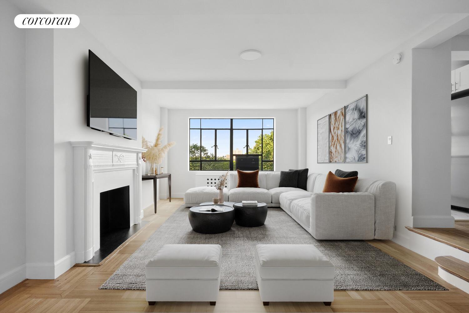 a living room with fireplace furniture and a flat screen tv