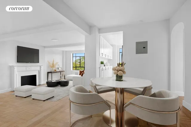 a living room with fireplace furniture and a flat screen tv