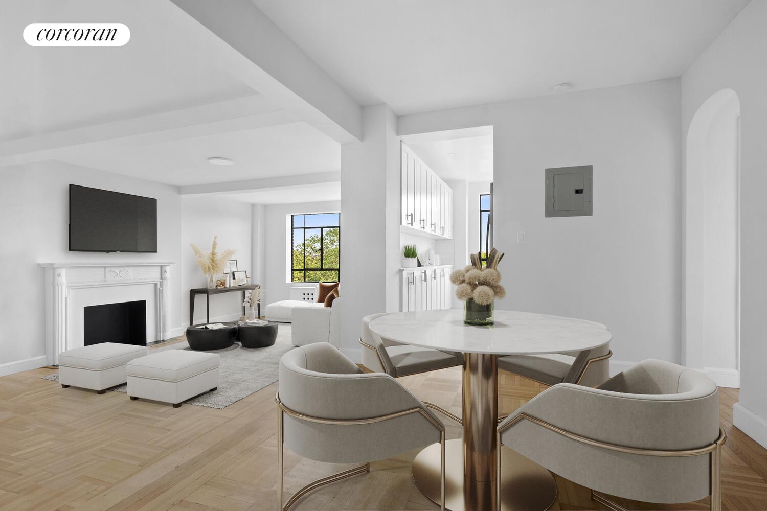 100 Riverside Drive, Unit 7B Manhattan, NY 10024 - Photo 3 of 11 a living room with fireplace furniture and a flat screen tv