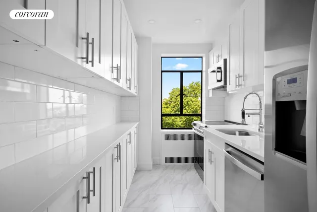 a kitchen with a sink stove and refrigerator