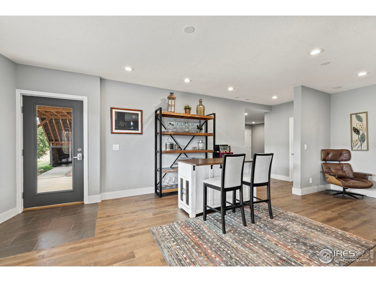 6586 Abaco Lane Berthoud, CO 80513 - Photo 17 of 40 a view of a dining room with furniture