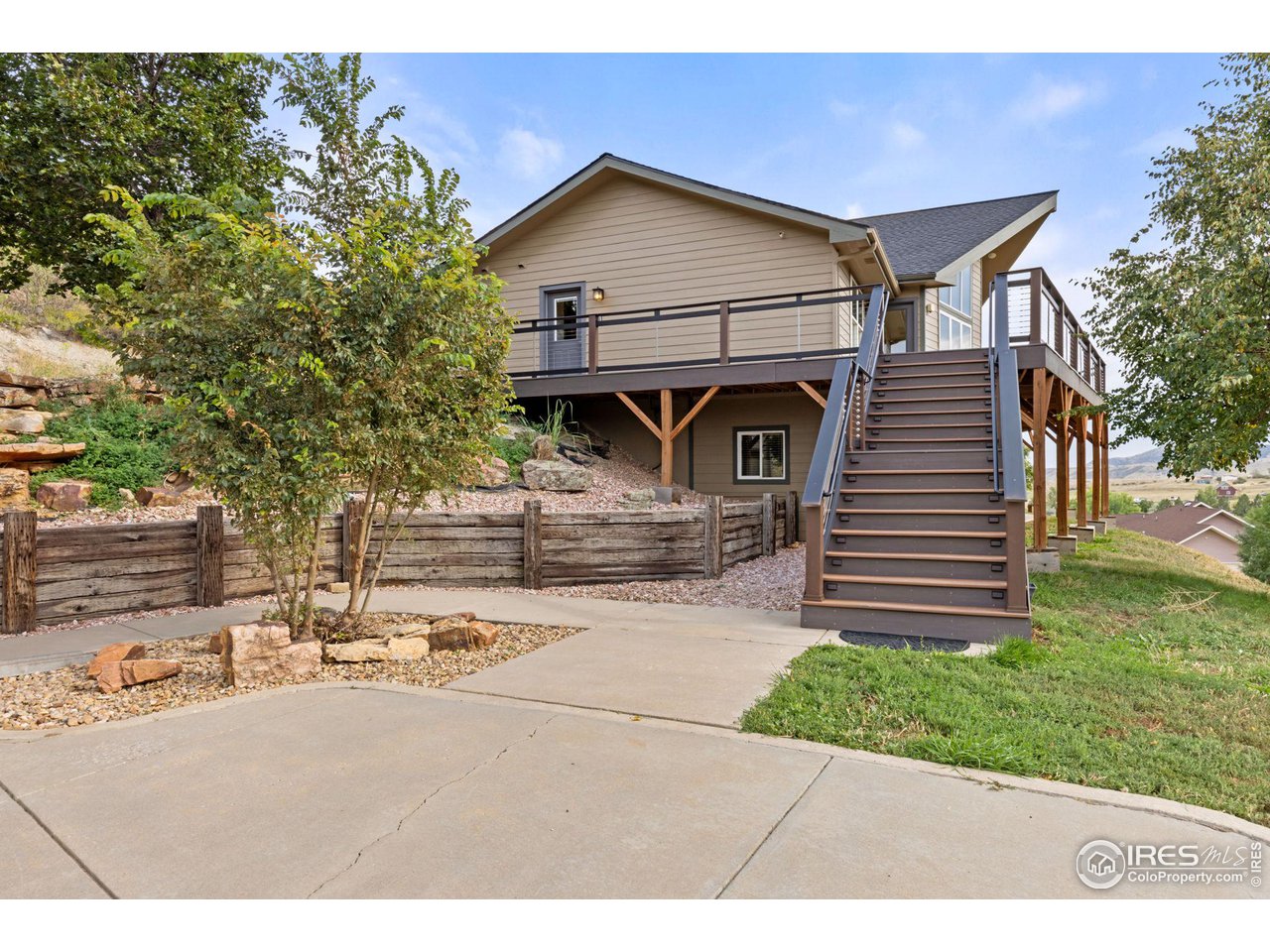 6586 Abaco Lane Berthoud, CO 80513 - Photo 2 of 40 a house view with a outdoor space