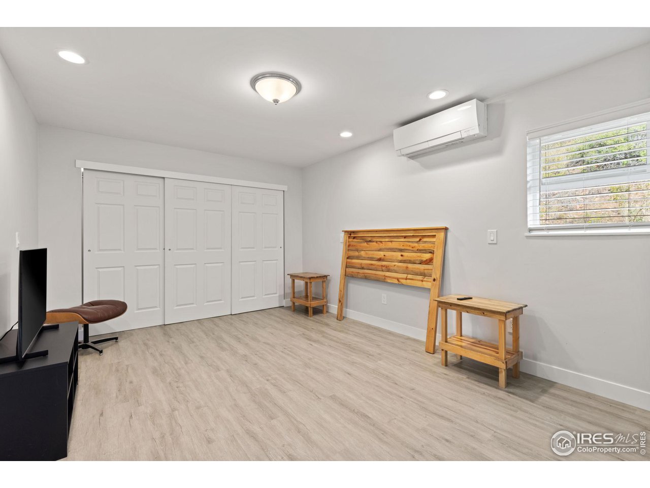 6586 Abaco Lane Berthoud, CO 80513 - Photo 30 of 40 a view of room with furniture and wooden floor