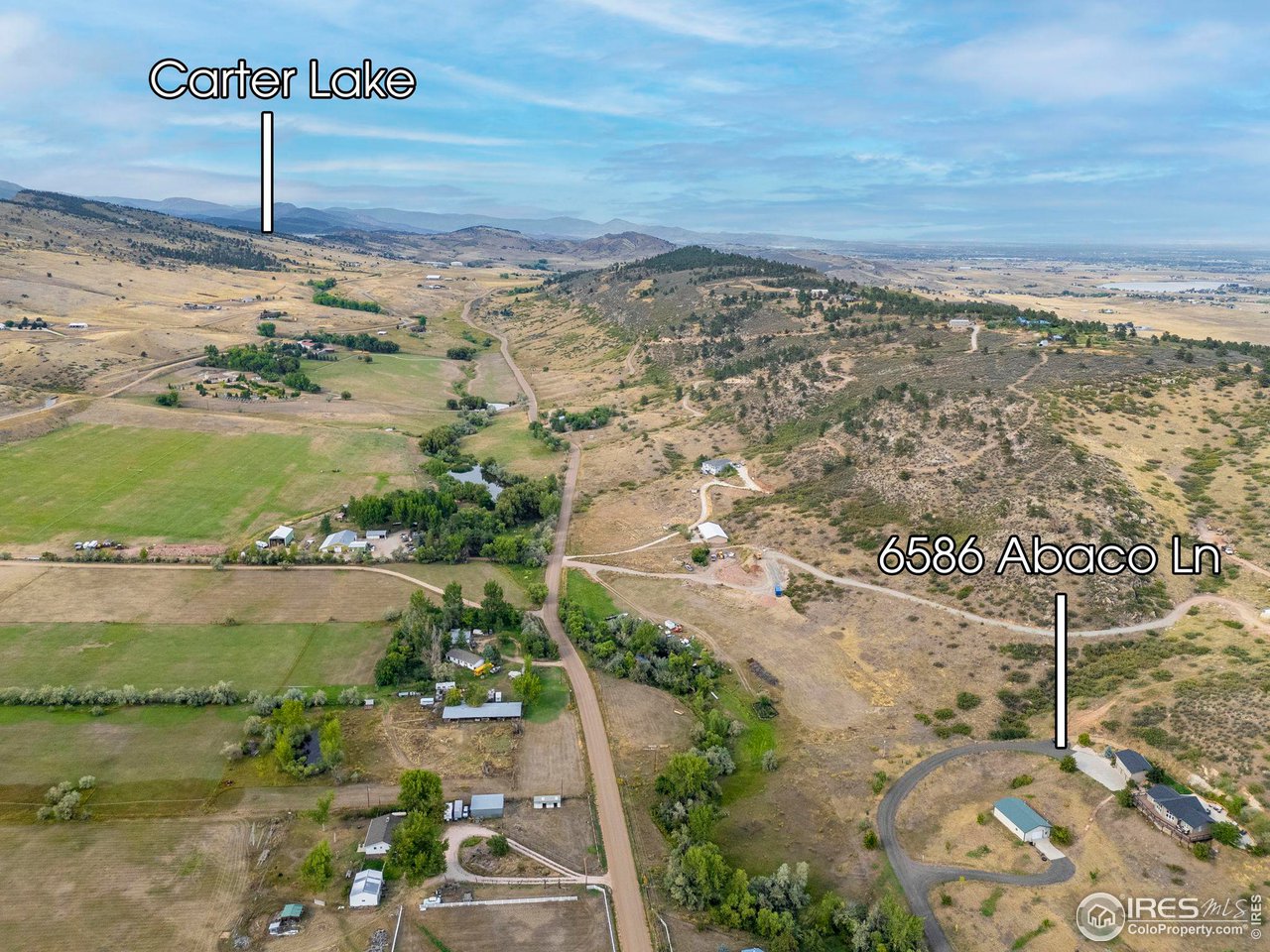 6586 Abaco Lane Berthoud, CO 80513 - Photo 37 of 40 a view of a city with an ocean beach
