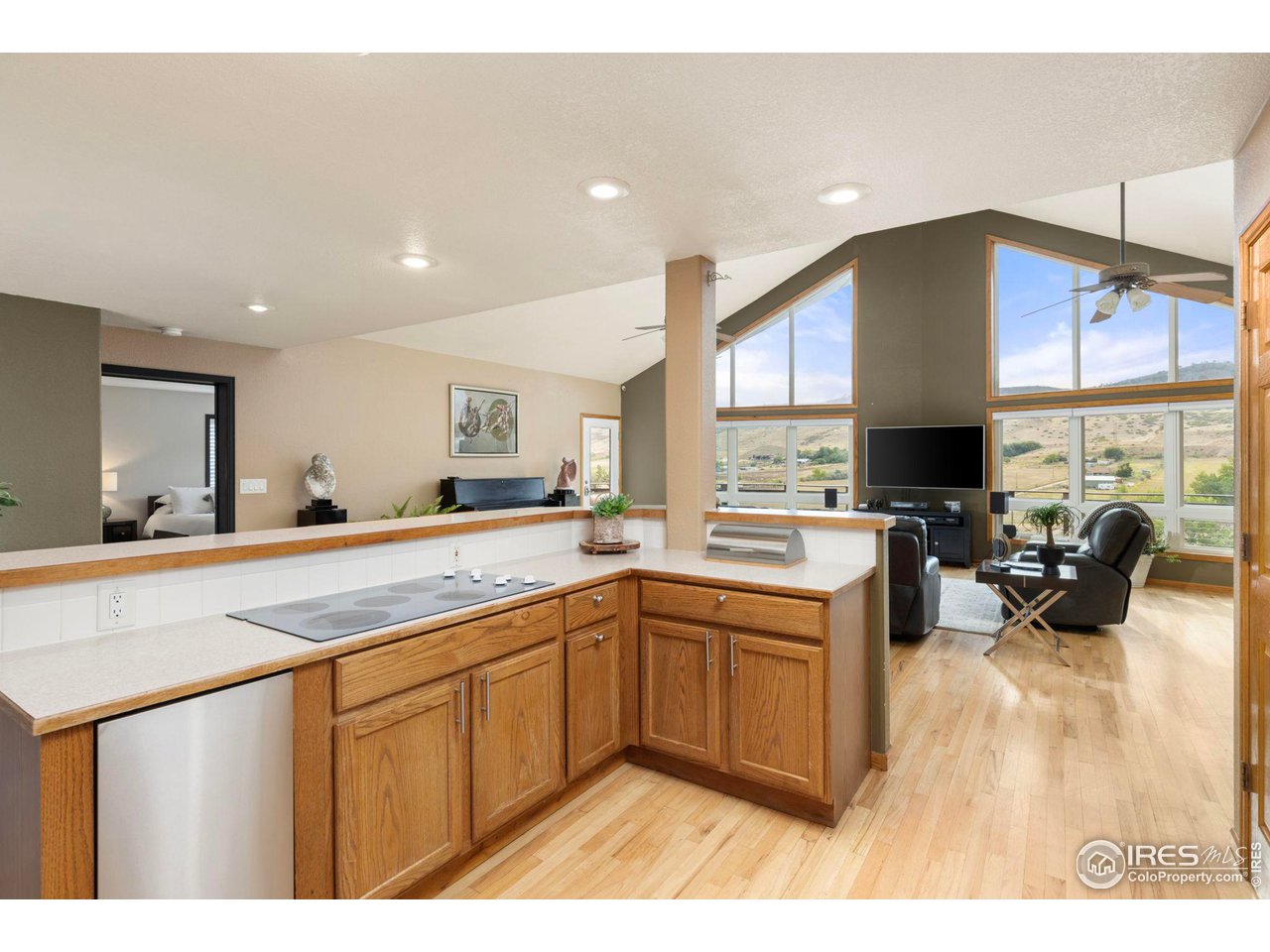 6586 Abaco Lane Berthoud, CO 80513 - Photo 10 of 40 a kitchen with a sink appliances and cabinets