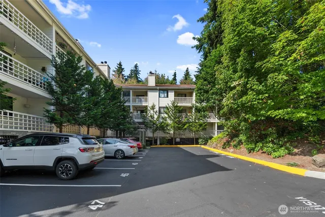 a view of a car parked in front of a house