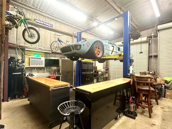 a room with table and chairs