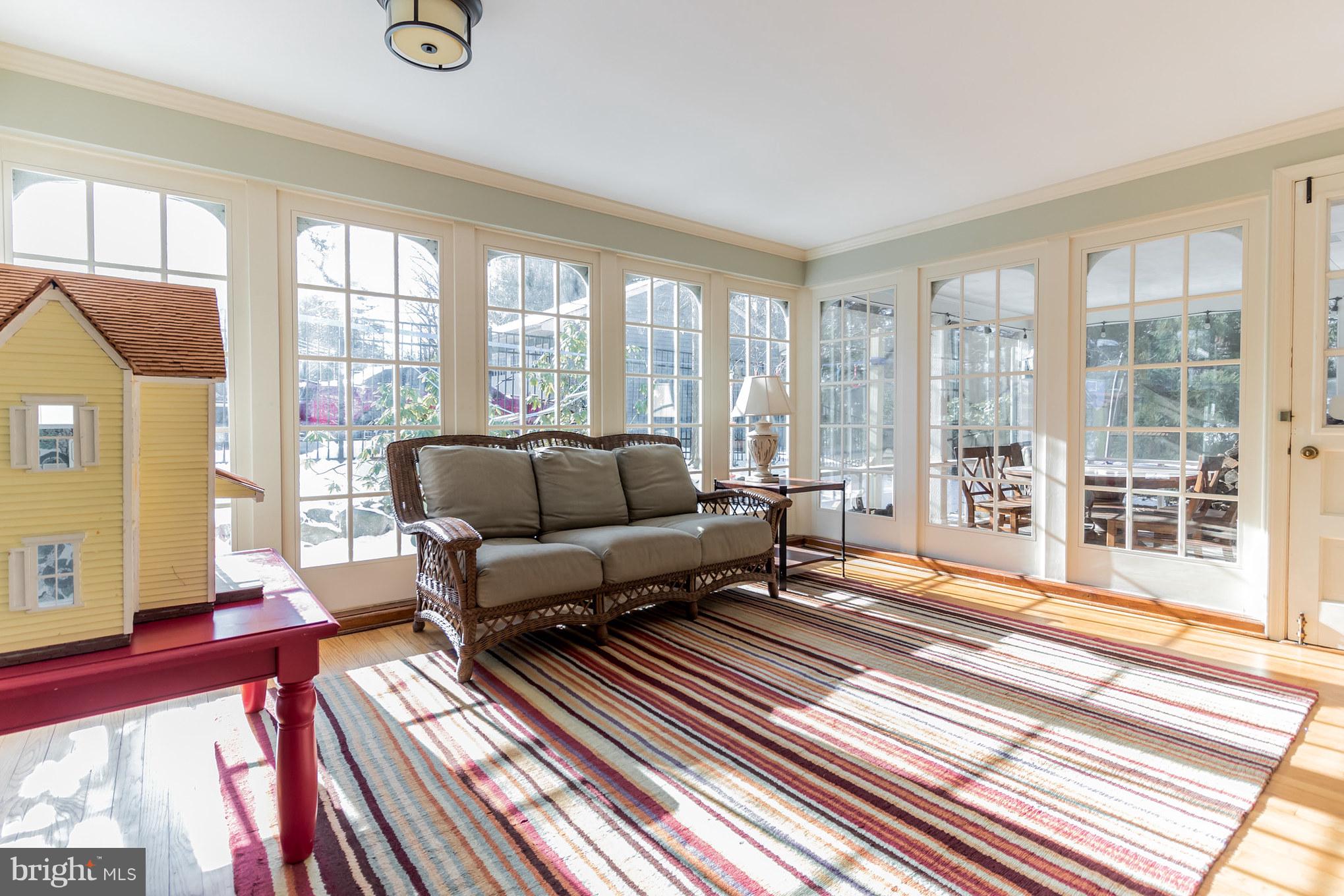106 Orchard Road Paoli, PA 19301 - Photo 7 of 29 Sunroom and family room