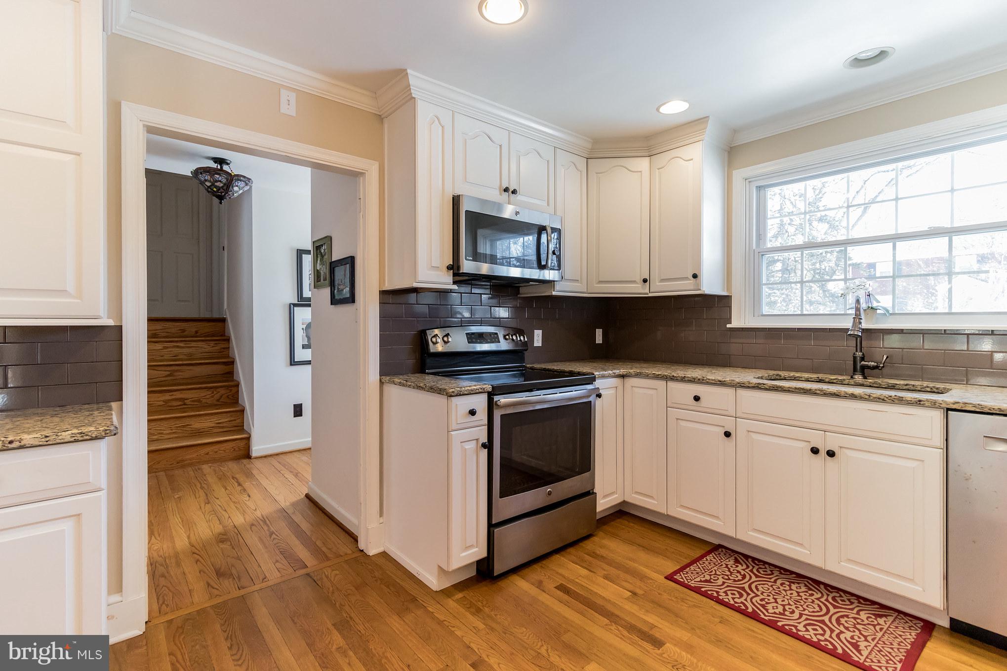 106 Orchard Road Paoli, PA 19301 - Photo 9 of 29 Open kitchen with breakfast bar