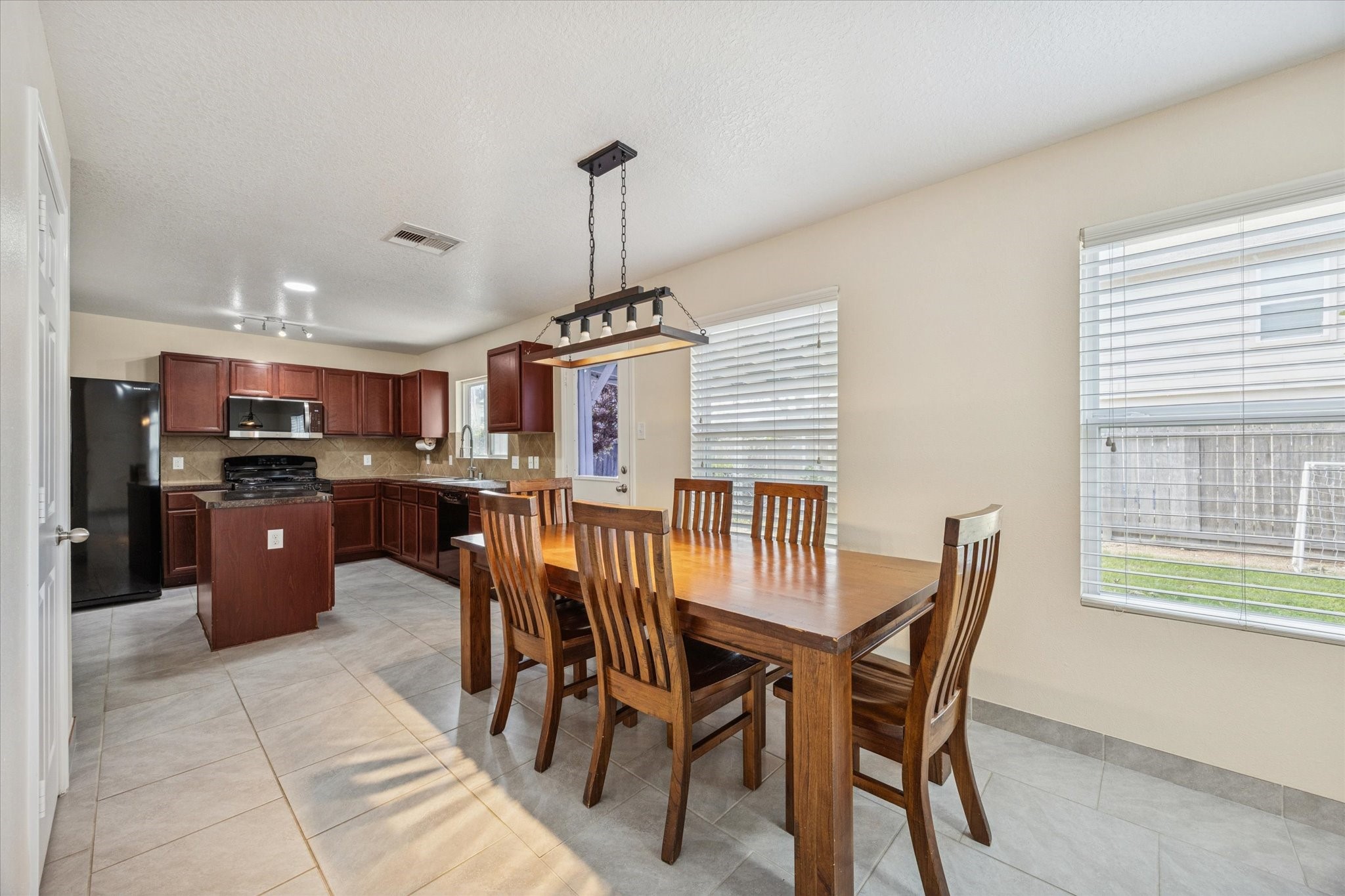5003 Juniper Spring Trail Katy, TX 77449 - Photo 3 of 13 a view of a dining room with furniture