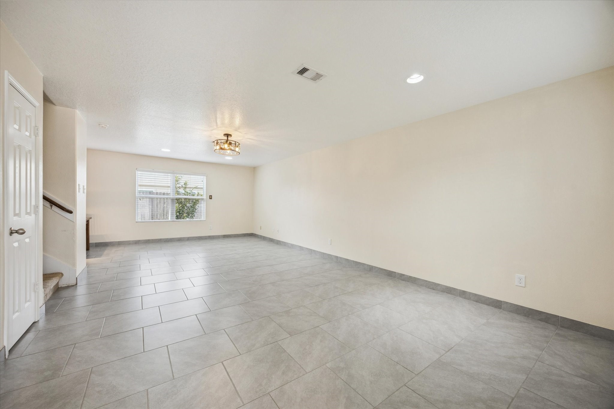 5003 Juniper Spring Trail Katy, TX 77449 - Photo 4 of 13 a view of an empty room with a window