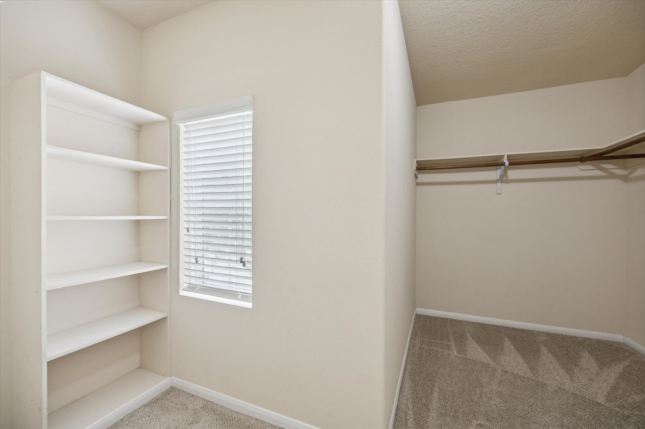 5003 Juniper Spring Trail Katy, TX 77449 - Photo 8 of 13 a view of room and closet