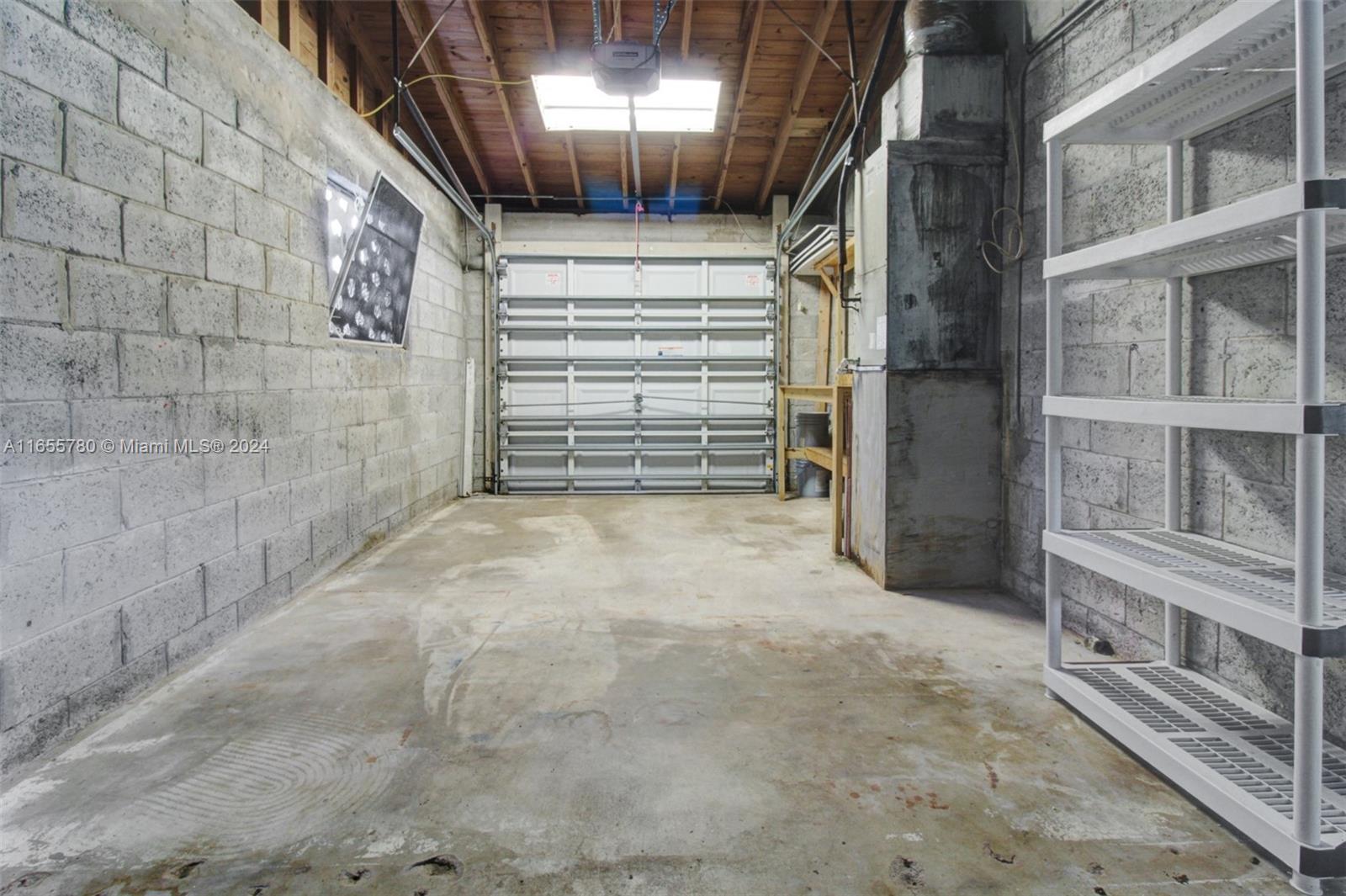 6990 Southwest 58th Street Miami, FL 33143 - Photo 11 of 11 a view of an empty room with a staircase