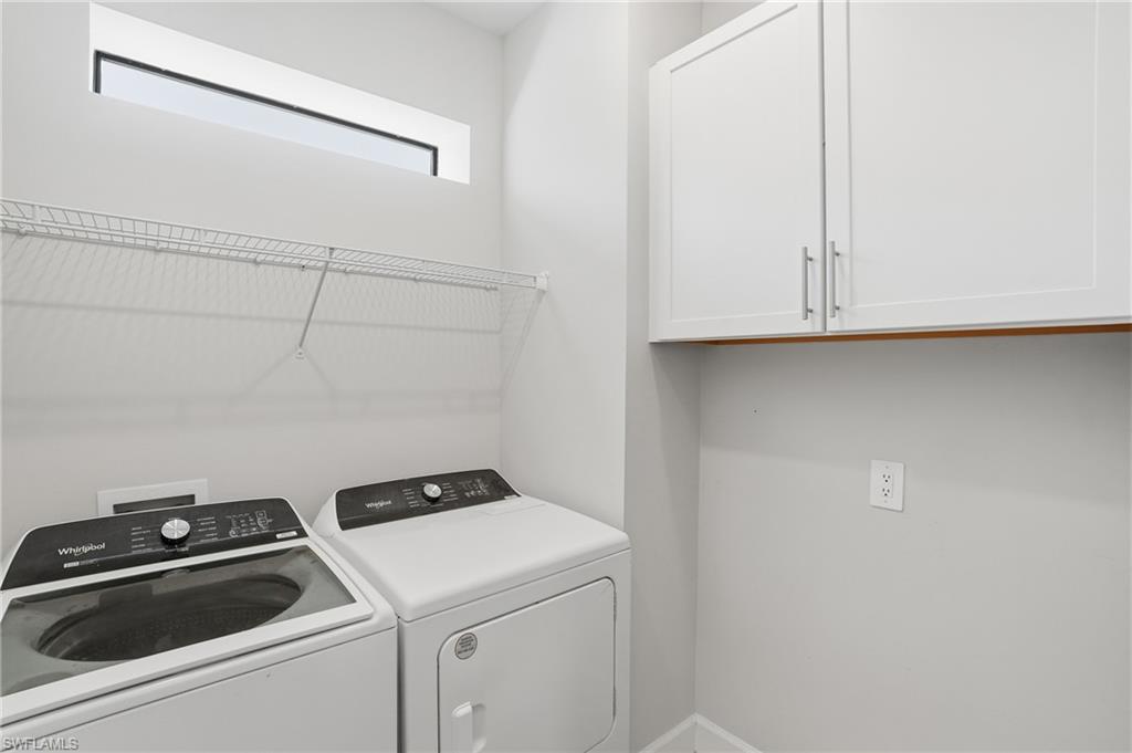 17377 Corsini Drive Fort Myers, FL 33913 - Photo 25 of 49 a utility room with dryer and washer