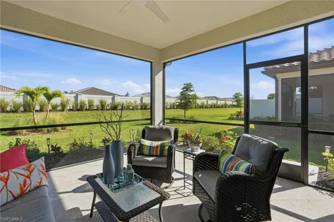 a balcony with outdoor seating
