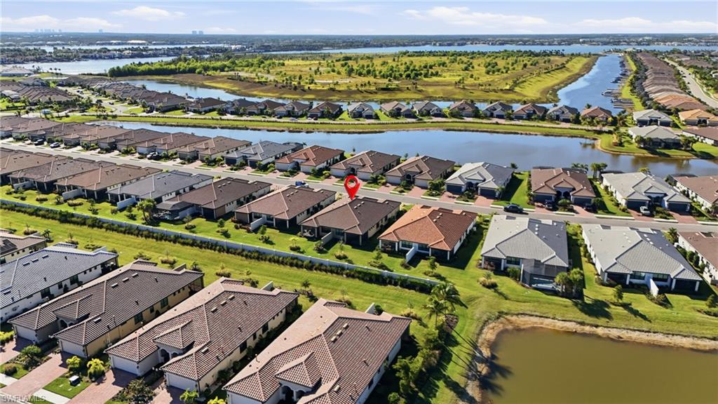 17377 Corsini Drive Fort Myers, FL 33913 - Photo 32 of 49 an aerial view of a city and lake view