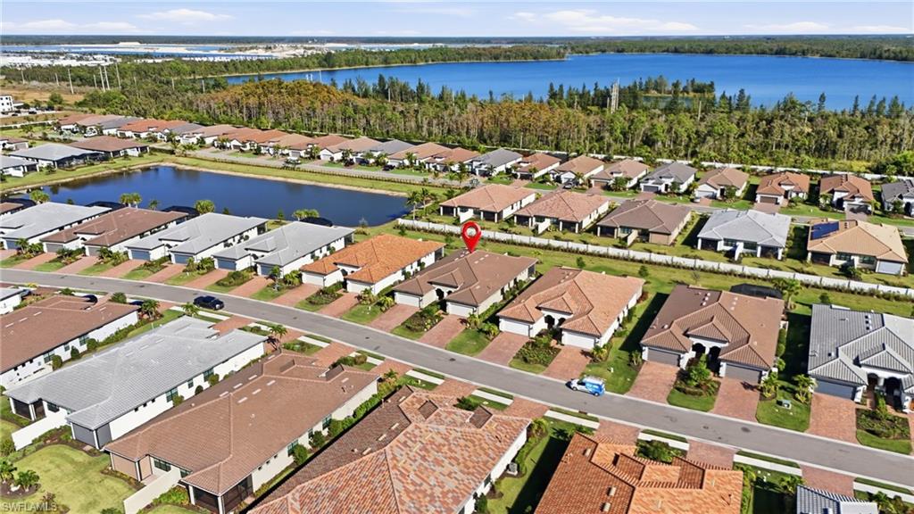 17377 Corsini Drive Fort Myers, FL 33913 - Photo 33 of 49 an aerial view of a city with houses