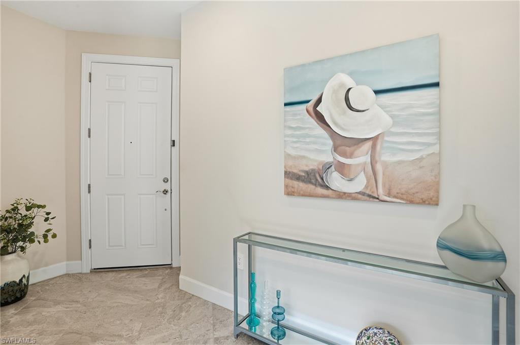 17377 Corsini Drive Fort Myers, FL 33913 - Photo 4 of 49 a bathroom with a sink and a mirror