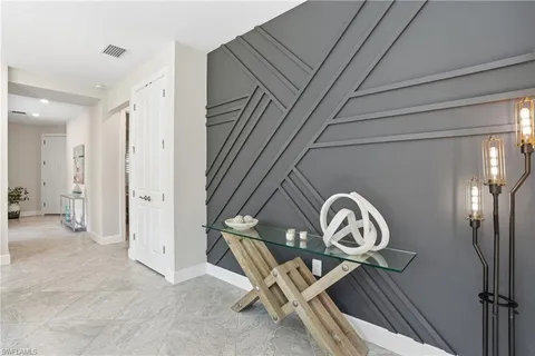 a view of a hallway with entryway