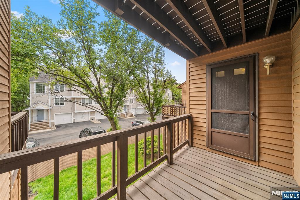 140 Allwood Road, Unit C Clifton, NJ 07012 - Photo 18 of 31 a view of a balcony with wooden floor