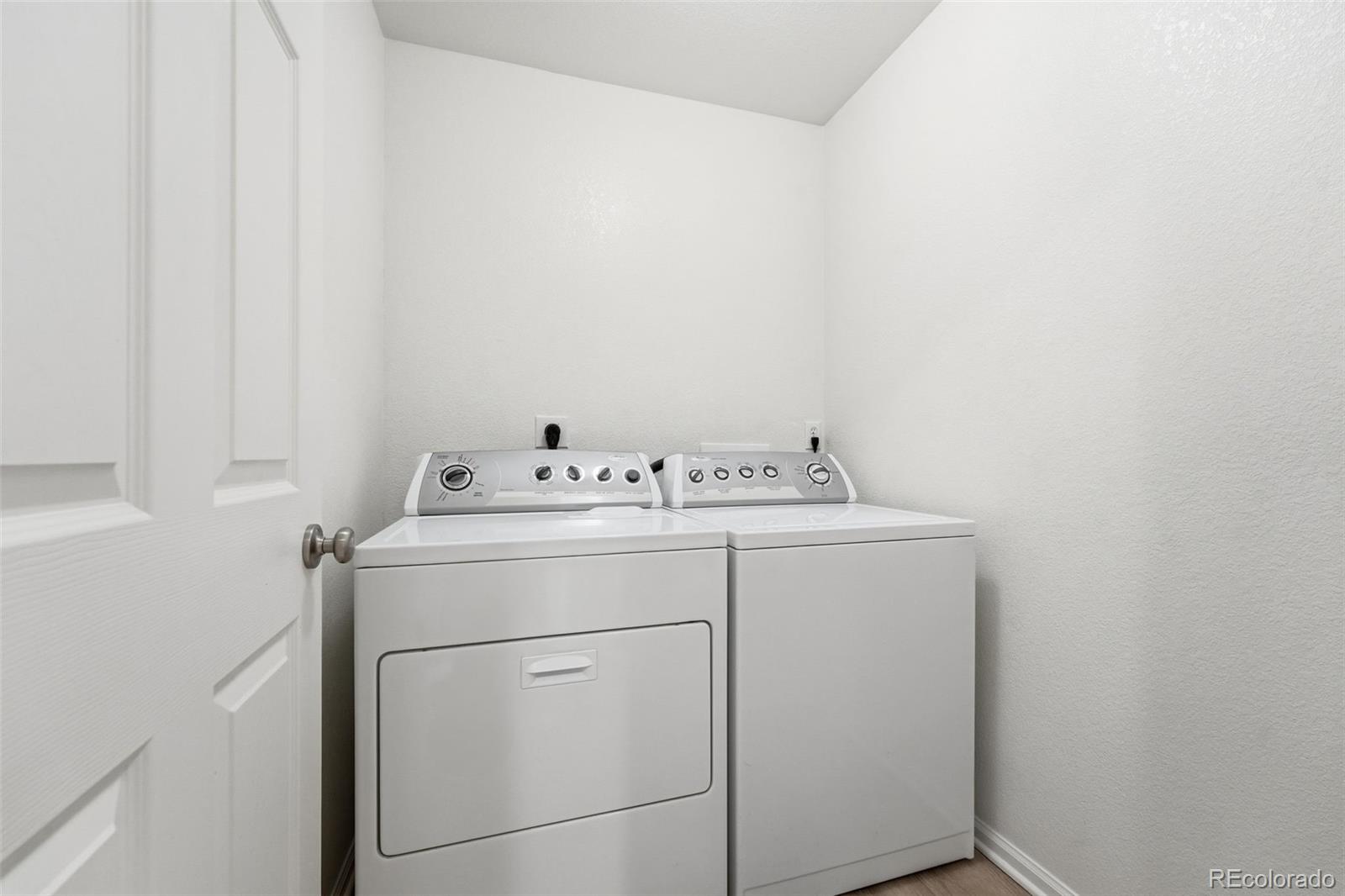 5811 Ceylon Street Denver, CO 80249 - Photo 22 of 43 a utility room with dryer and washer