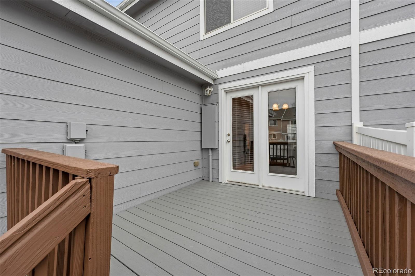 5811 Ceylon Street Denver, CO 80249 - Photo 38 of 43 a view of a house with a deck
