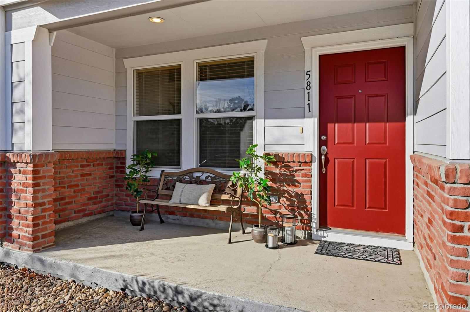 5811 Ceylon Street Denver, CO 80249 - Photo 4 of 43 a building outdoor space with patio furniture