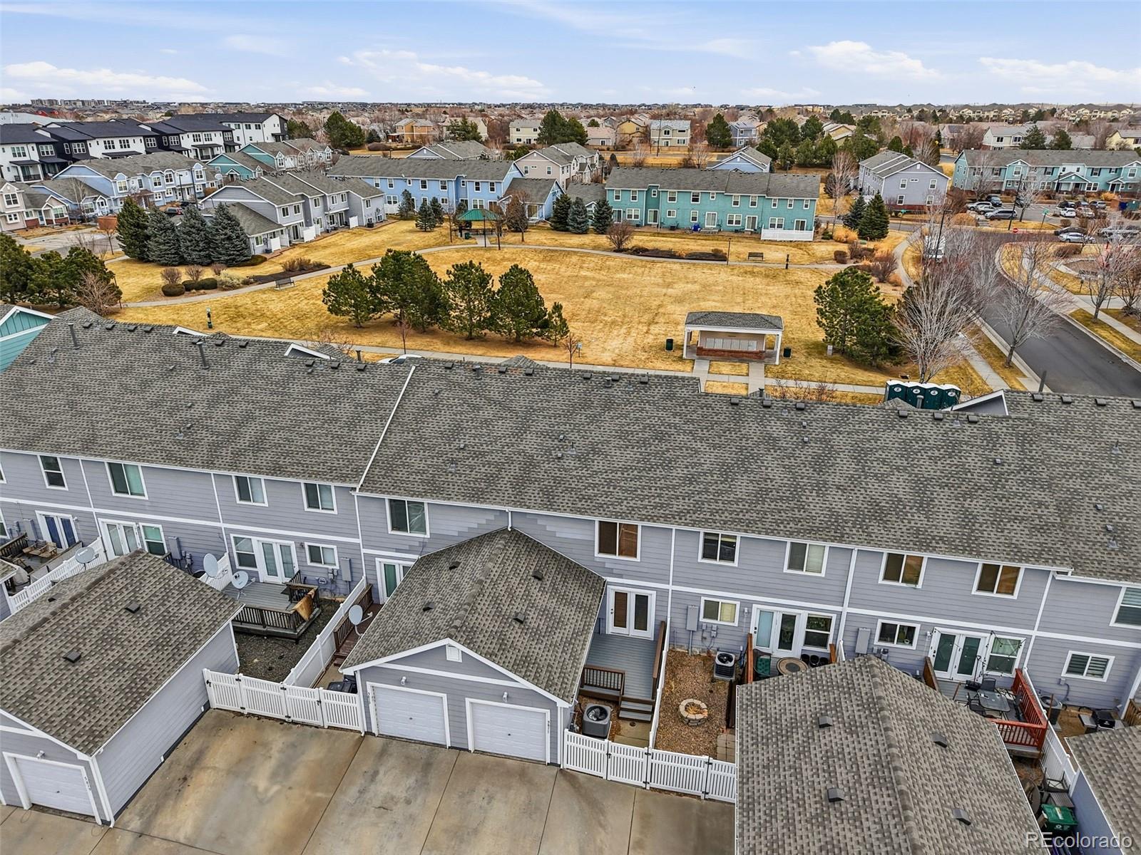 5811 Ceylon Street Denver, CO 80249 - Photo 42 of 43 an aerial view of residential houses with outdoor space
