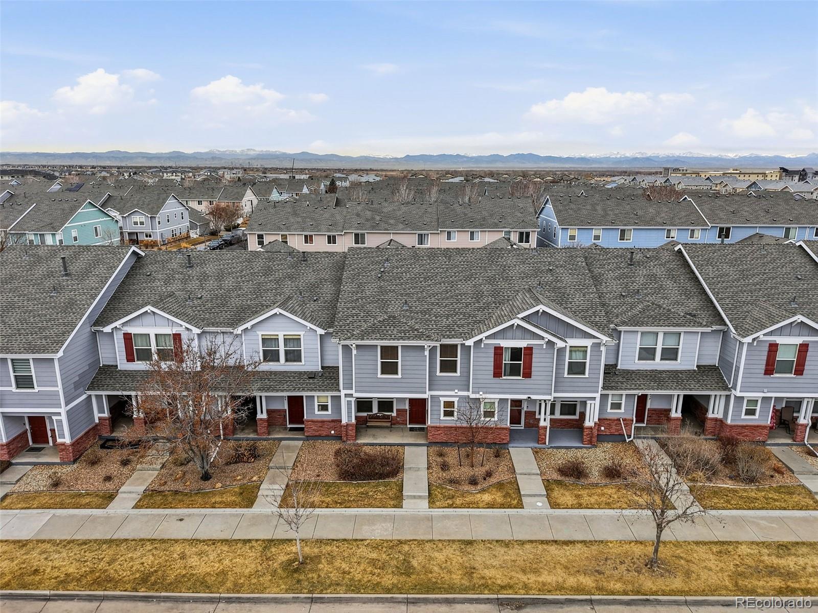 5811 Ceylon Street Denver, CO 80249 - Photo 43 of 43 an aerial view of residential houses with outdoor space