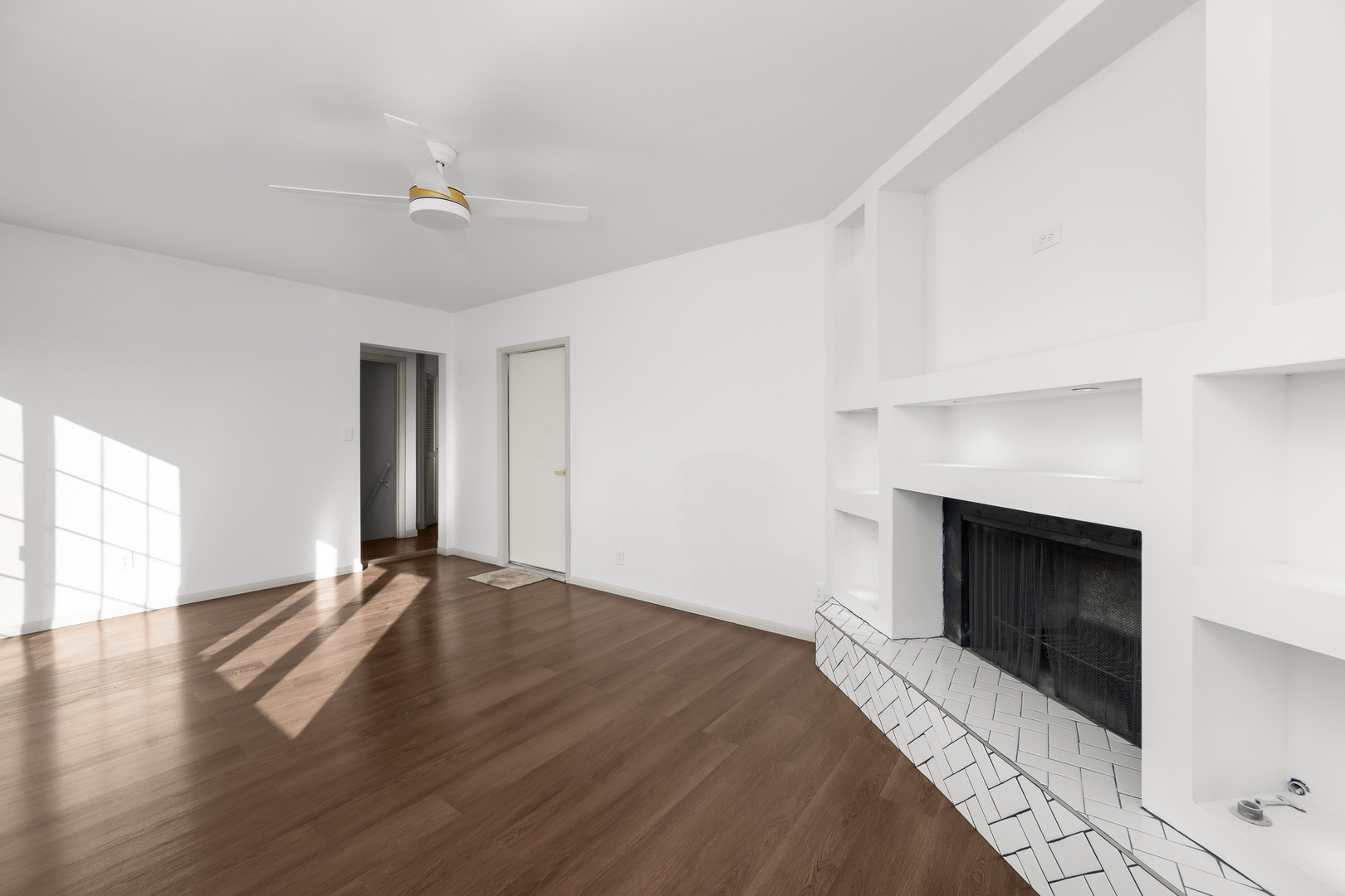 2518 13th Street Rock Island, IL 61201 - Photo 11 of 37 a view of an empty room with window and fireplace