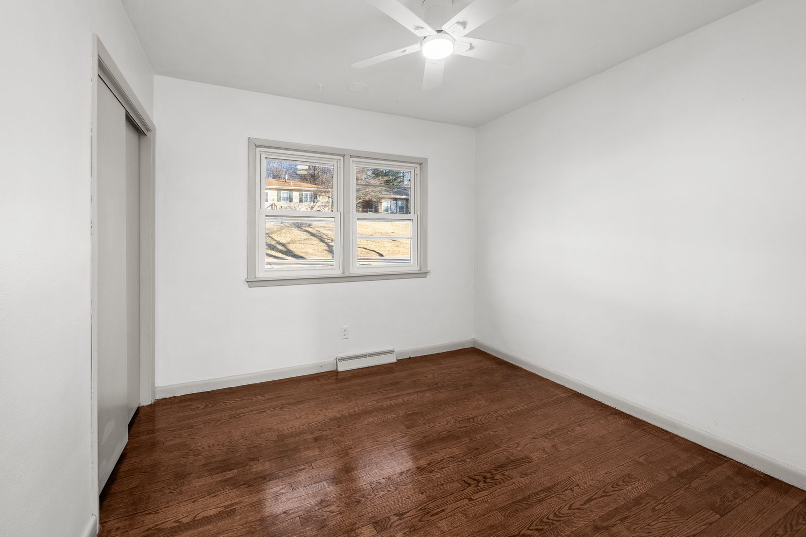 2518 13th Street Rock Island, IL 61201 - Photo 15 of 37 an empty room with a window