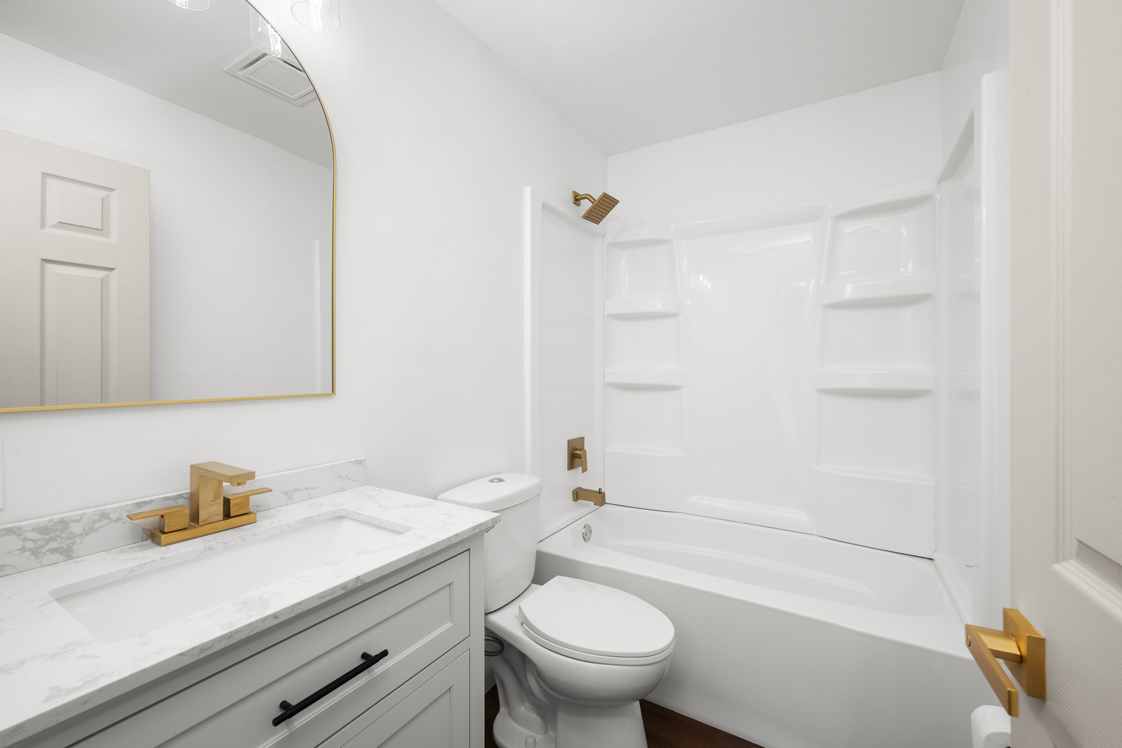 2518 13th Street Rock Island, IL 61201 - Photo 17 of 37 a bathroom with a sink a toilet and shower
