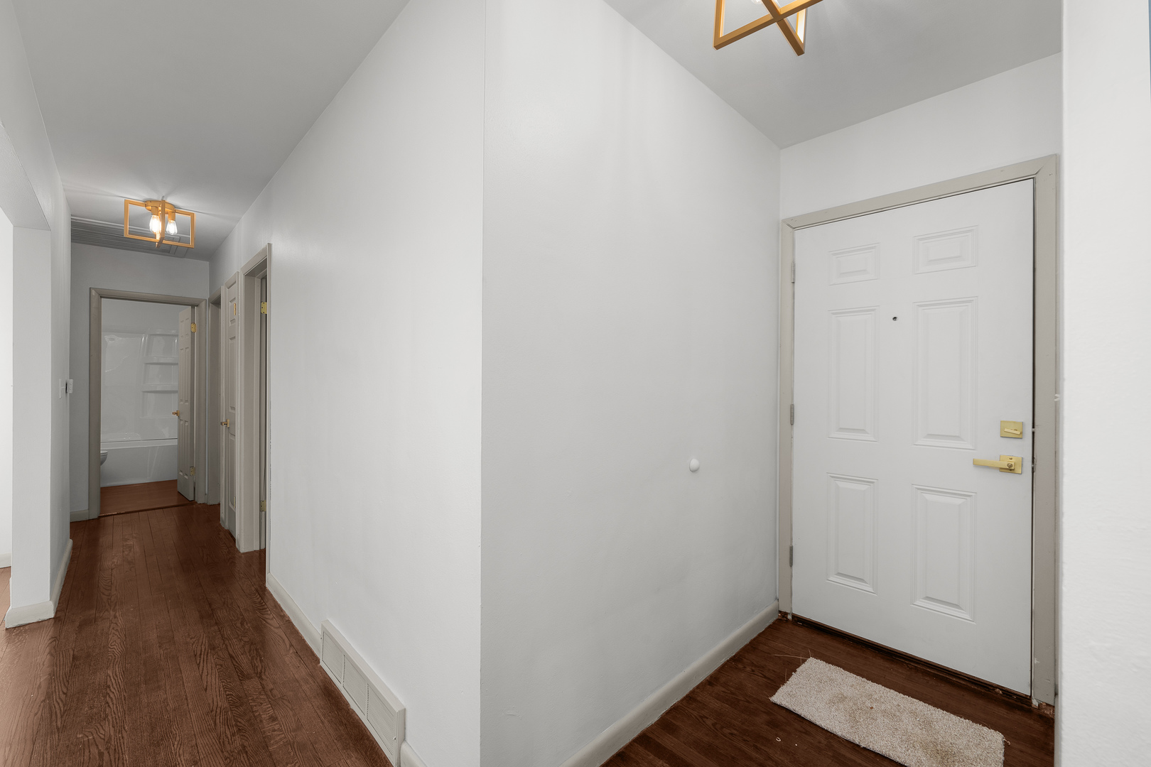 2518 13th Street Rock Island, IL 61201 - Photo 3 of 37 a view of a hallway with wooden floor