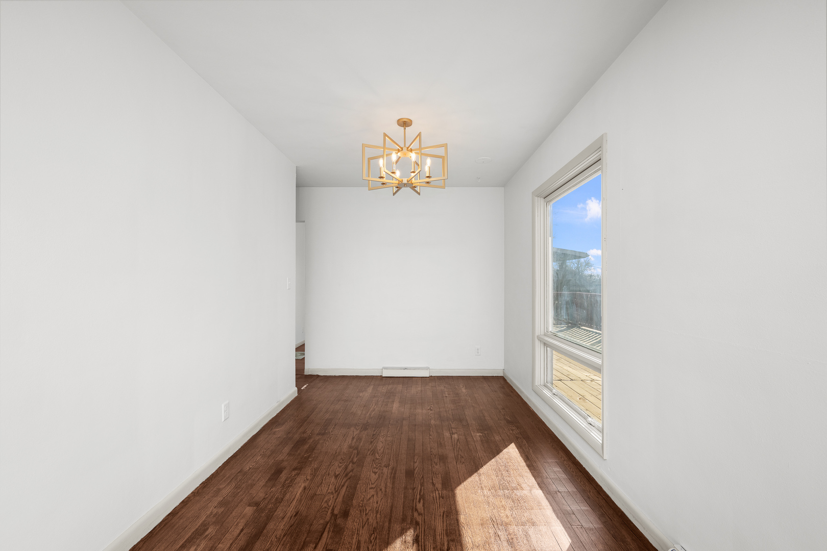 2518 13th Street Rock Island, IL 61201 - Photo 7 of 37 a very nice looking room with wooden floor