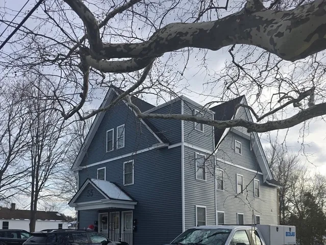 a view of a house with a snow