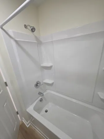 a bathroom with a bathtub