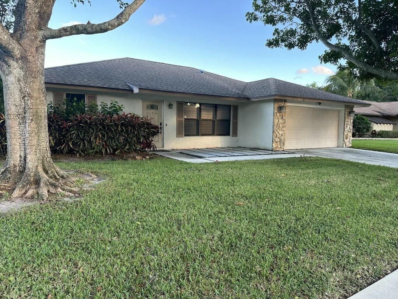 10714 Ranchipur Street Boynton Beach, FL 33437 - Photo 2 of 13 Front View