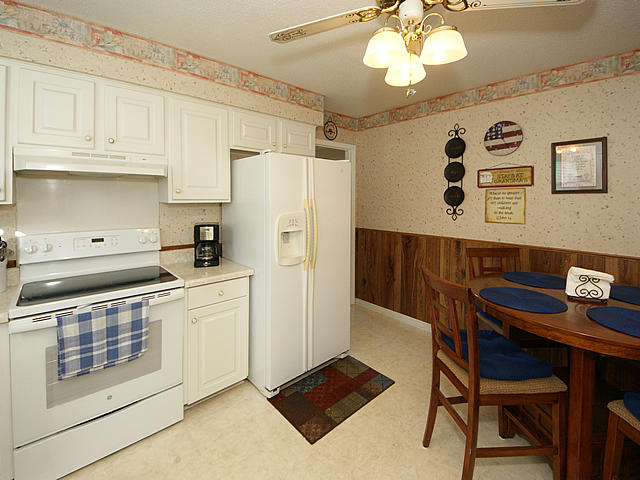 7688 Brandywine Road North Charleston, SC 29420 - Photo 8 of 24 Newer stove and fridge stays