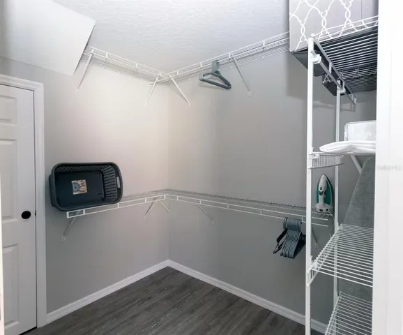 a bathroom with a tub and shower