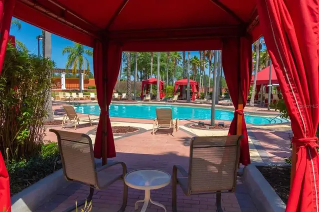 a view of a house with a swimming pool