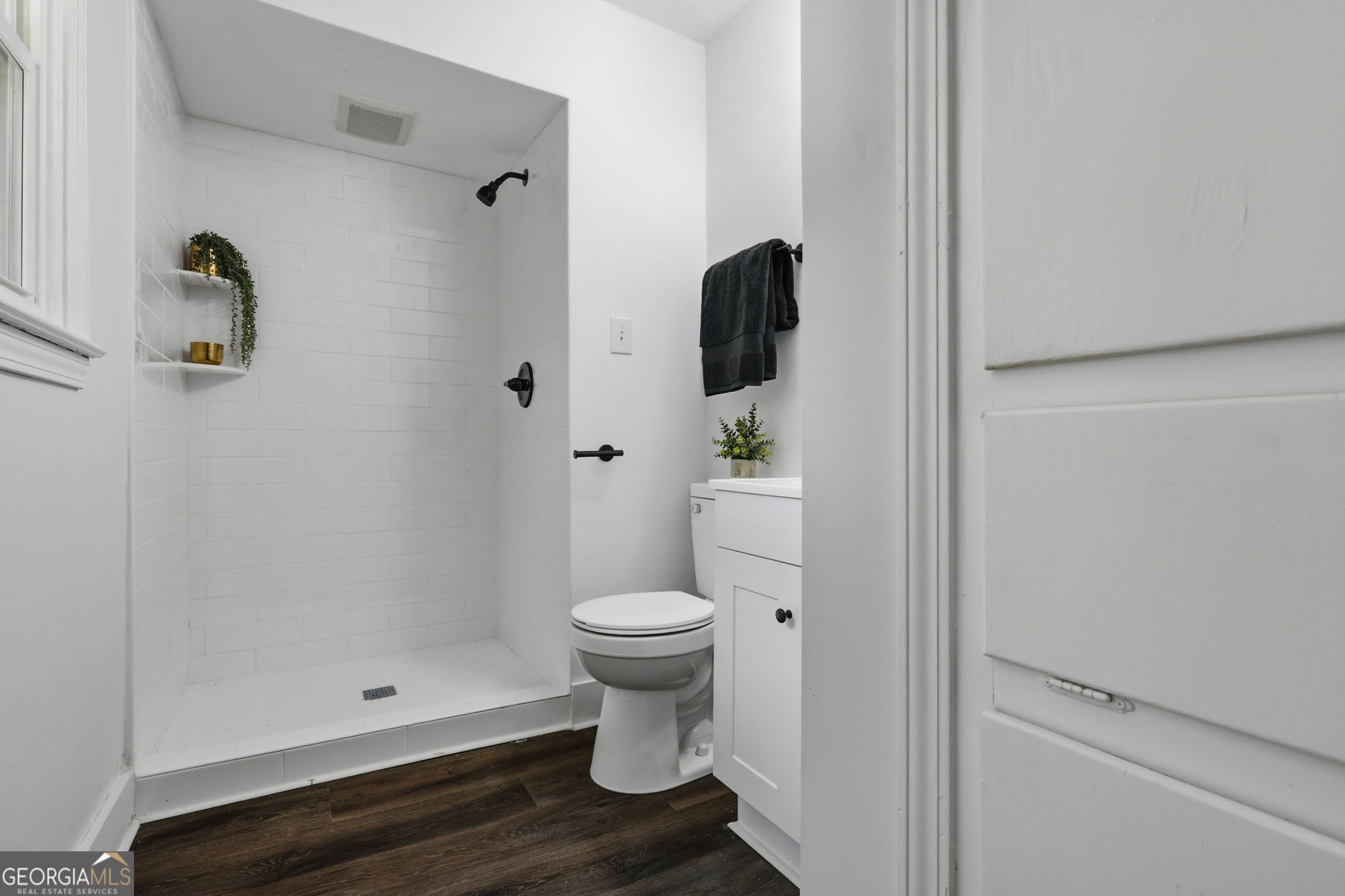 4443 Ritch Haven Road Columbus, GA 31909 - Photo 16 of 42 All white tile shower w/new black fixtures