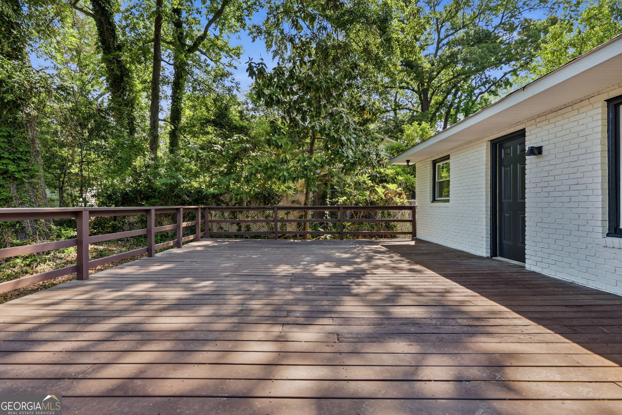 4443 Ritch Haven Road Columbus, GA 31909 - Photo 25 of 42 Deck is accessed from the living room/kitchen area.